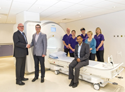 Liverpool Heart and Chest Hospital NHS Foundation Trust has expanded its cardiac MR imaging capabilities with the installation of a MAGNETOM® Aera 1.5T MRI system from Siemens Healthcare. Left to right: John Brady, Regional Sales Manager at Siemens Healthcare; Dr John Holemans, Consultant Radiologist; Kieran Murphy, Superintendent Radiographer; Daniel Birchall, Senior Radiographer; Dr Sukumaran Binukrishnan, Consultant Radiologist (seated); Sophie Worrall, Senior Radiographer; Janette Rekatas, Radiology Manager; and Fiona Hopcroft, Senior Radiographer at Liverpool Heart and Chest Hospital.